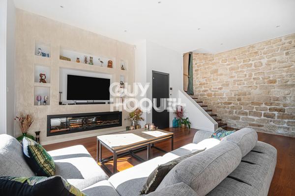 Maison d'exception -128 m2 -100 m2 de jardin arboré