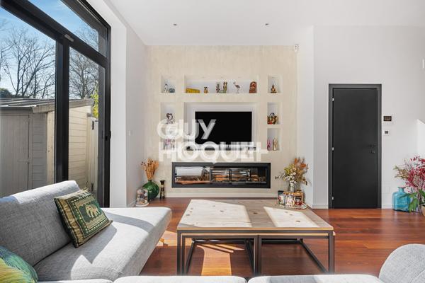 Maison d'exception -128 m2 -100 m2 de jardin arboré