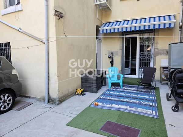 Appartement T4 traversant en rez-de-chaussée avec grande terrasse dans le centre-ville de Givors