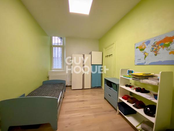 Appartement T4 traversant en rez-de-chaussée avec grande terrasse dans le centre-ville de Givors