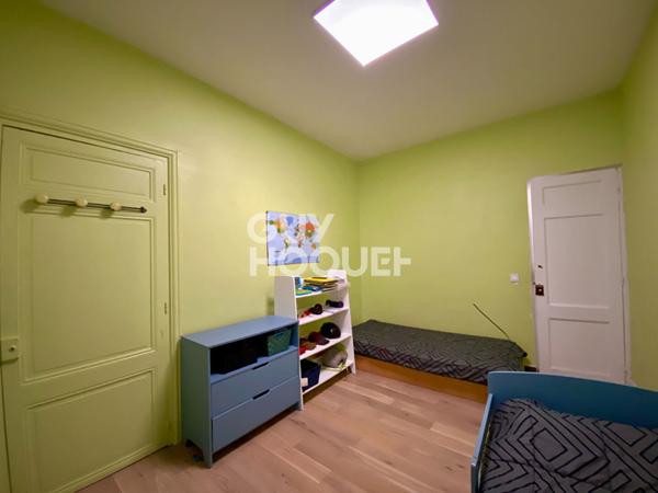 Appartement T4 traversant en rez-de-chaussée avec grande terrasse dans le centre-ville de Givors