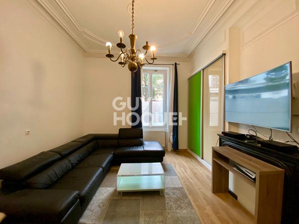 Appartement T4 traversant en rez-de-chaussée avec grande terrasse dans le centre-ville de Givors