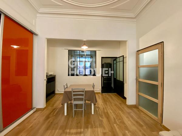 Appartement T4 traversant en rez-de-chaussée avec grande terrasse dans le centre-ville de Givors
