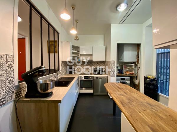 Appartement T4 traversant en rez-de-chaussée avec grande terrasse dans le centre-ville de Givors