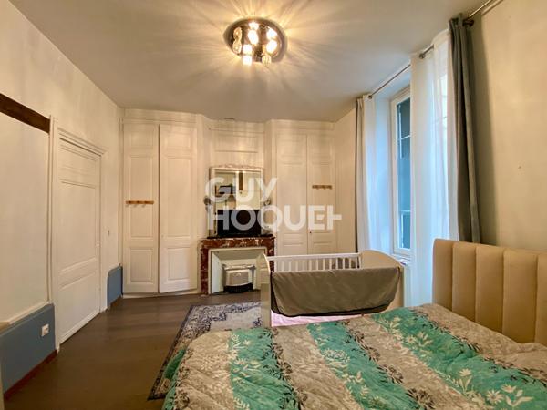 Appartement T4 traversant en rez-de-chaussée avec grande terrasse dans le centre-ville de Givors