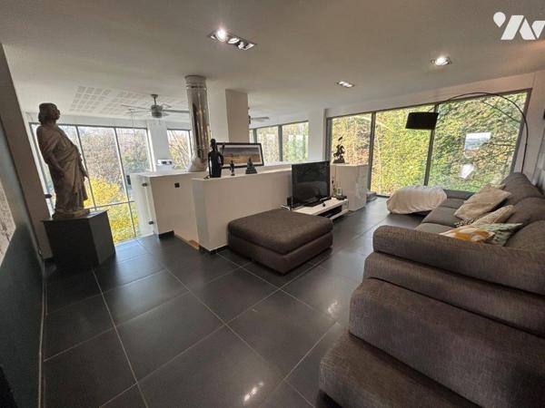 Demeure d'architecte érigée dans un ancien moulin à vendre à PROVILLE.