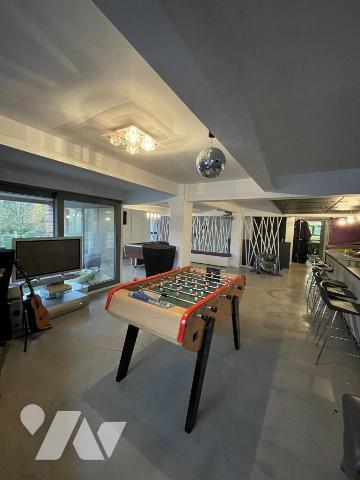 Demeure d'architecte érigée dans un ancien moulin à vendre à PROVILLE.