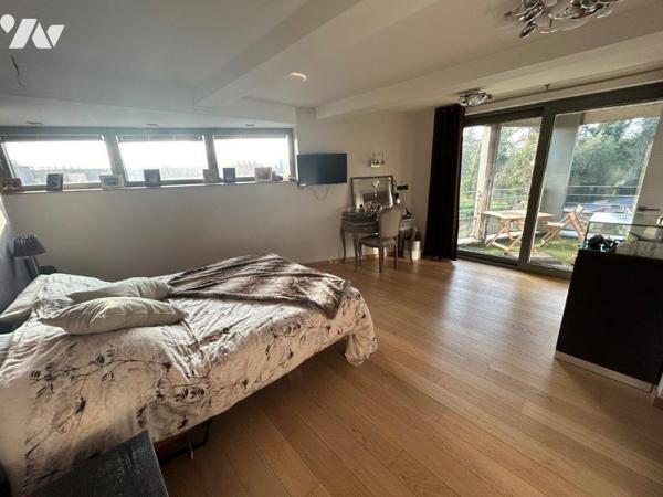 Demeure d'architecte érigée dans un ancien moulin à vendre à PROVILLE.