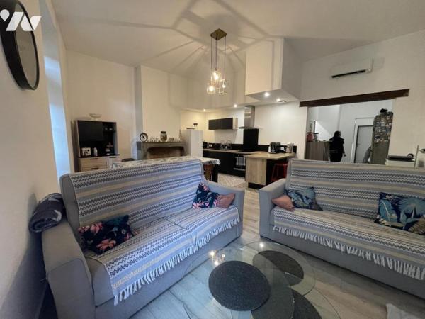 Immeuble avec locaux commeciaux, local professionnel et habitation investissement