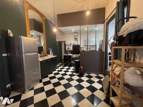 Immeuble avec locaux commeciaux, local professionnel et habitation investissement