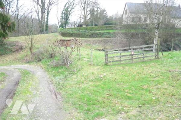 A vendre à Ambrières les vallées(53), sortie de ville, un terrain de 2 451 m² comprenant une ma...