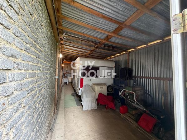 Terrain viabilisé à vendre avec garage à NESLE (80190).