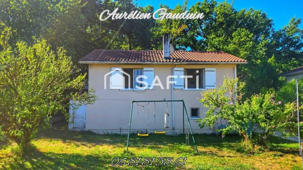 Maison avec terrain arboré de 1 180 m² et garage