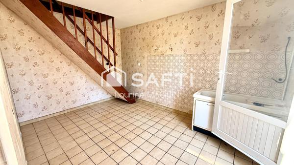 Maison en pierre disposant d'une grange attenante