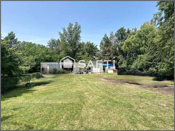 Terrain à bâtir d'environ 1600 M2 avec dépendance de 170 M2 et Mobile-homme