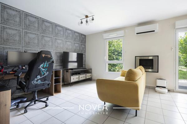 Rez-de-jardin avec garage double
