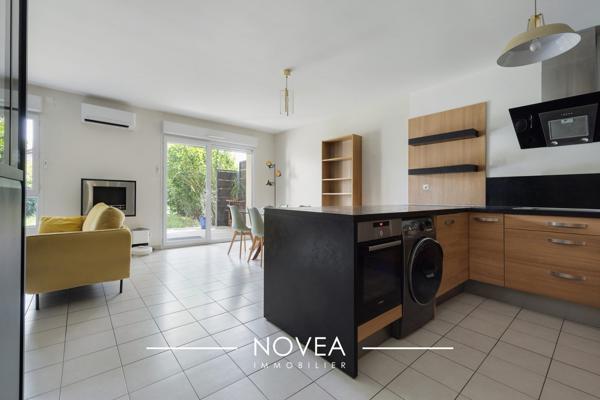Rez-de-jardin avec garage double