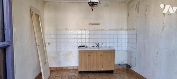 LA GUERCHE DE BGNE - Centre ville - Maison avec garage et terrain