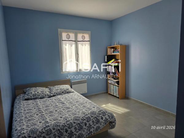 Maison familiale avec 4 chambres, garage 70 m² et jardin constructible