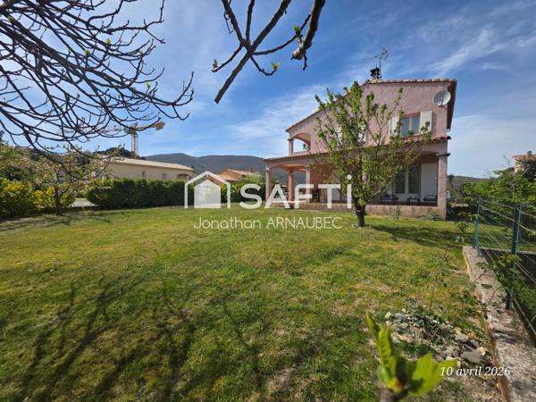 Maison familiale avec 4 chambres, garage 70 m² et jardin constructible