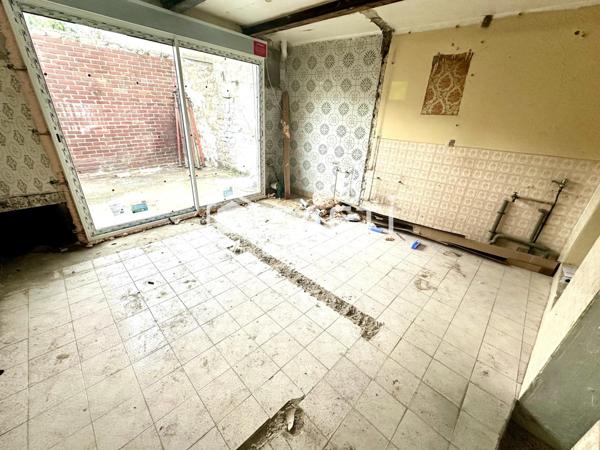 Maison de Ville à rénover avec un beau potentiel