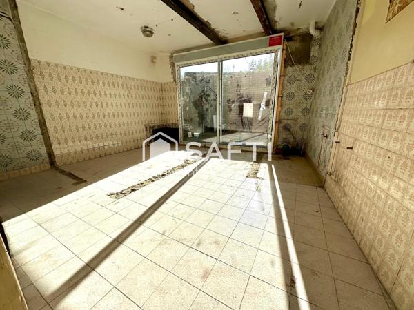 Maison de Ville à rénover avec un beau potentiel