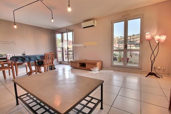 Appartement sur les toits + terrasse + parking+ garage