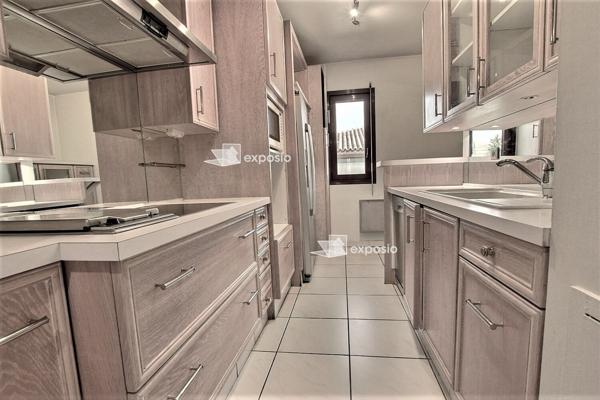 Appartement sur les toits + terrasse + parking+ garage