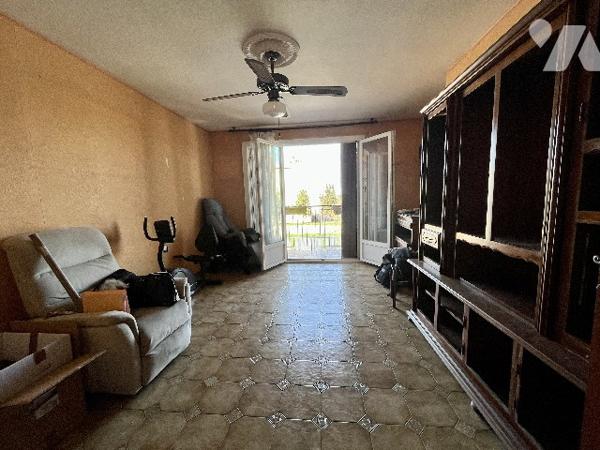 Appartement T3 traversant de 56m² avec deux balcons, stationnement dans résidence