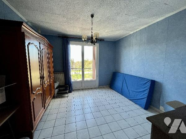 Appartement T3 traversant de 56m² avec deux balcons, stationnement dans résidence