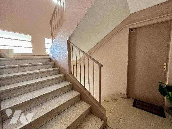 Appartement T3 traversant de 56m² avec deux balcons, stationnement dans résidence