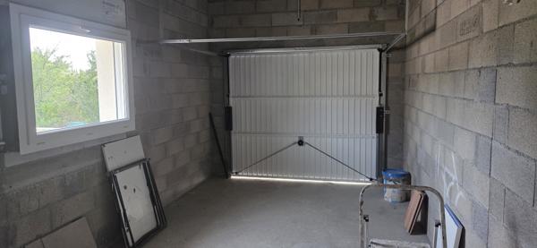 Maison RE 2020 de plain-pied avec garage