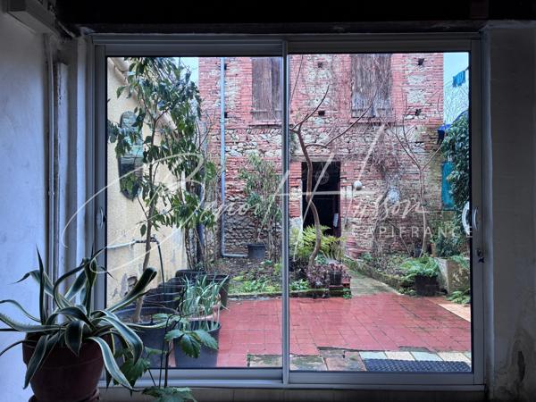 Maison de ville de 130m² avec cour, garage et dépendance