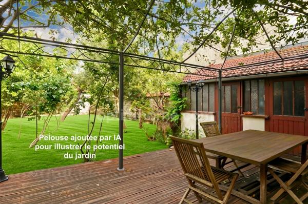 Maison de caractère avec jardin arboré -