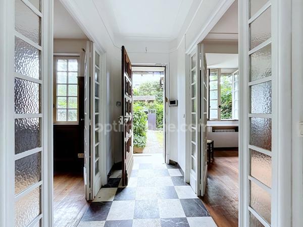 Maison de caractère avec jardin arboré -