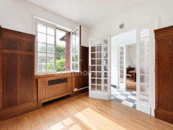 Maison de caractère avec jardin arboré -