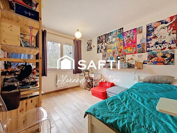 Maison 4 chambres, grand atelier, grande parcelle boisée.