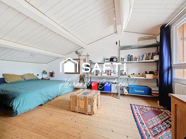 Maison 4 chambres, grand atelier, grande parcelle boisée.