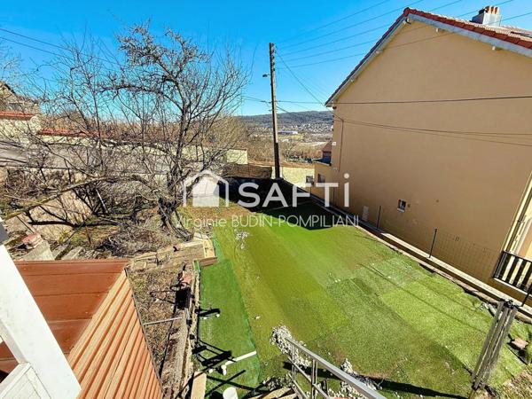 maison mitoyenne avec jardin et garage