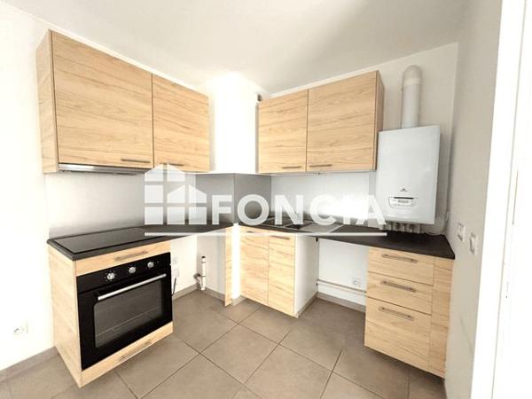 Location Appartement 2 pièces 41.2 m² - 5 RUE DOCTEUR BUTTERLIN Voiron 38500