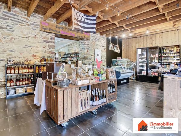 Murs Commerciaux + 2 Logements Neufs – Emplacement Stratégique