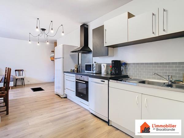 Murs Commerciaux + 2 Logements Neufs – Emplacement Stratégique