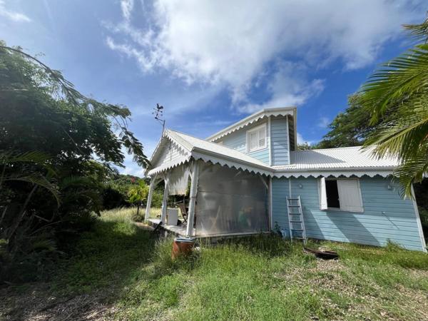 Maison T3 en bois de style créole, vue mer