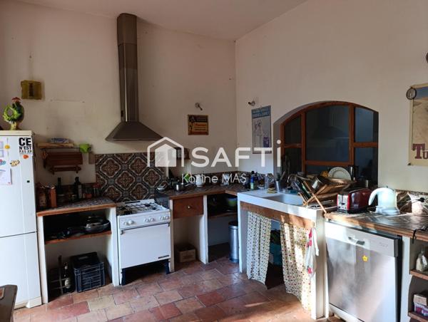 Ensemble immobilier, deux maisons plus divers bâtiments