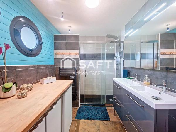 Maison en ossature bois de 126m² sans travaux à proximité du centre ville de Bessières et des commodités.