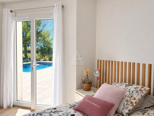Maison récente de 146 m² avec piscine sur terrain arboré de 1 646 m²