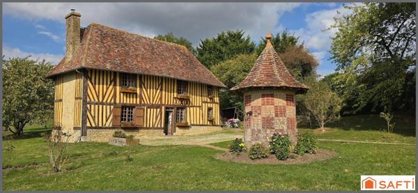 Propriété normande avec 3 maisons, vue dégagée.