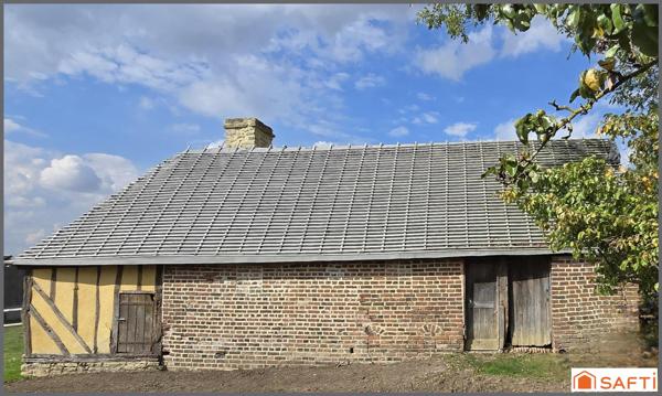 Propriété normande avec 3 maisons, vue dégagée.