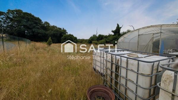 Sur le Secteur de Callac Terrain avec une partie constructible + hangar