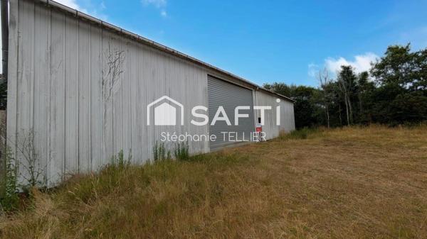 Sur le Secteur de Callac Terrain avec une partie constructible + hangar
